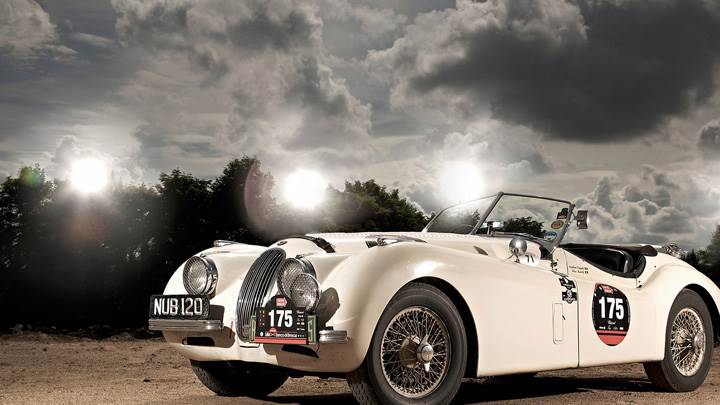 Jaguar XK120 Side Front Pose In White